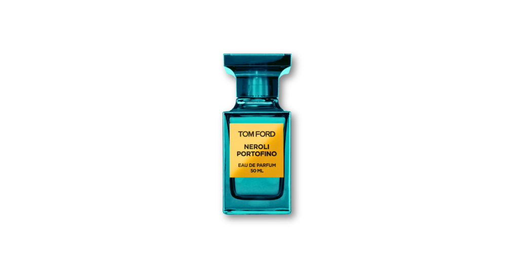 Tom Ford Neroli Portofino perfume bottle beside a Mediterranean coastline, with orange blossoms and blue sea, capturing a luxurious, aquatic citrus aroma.