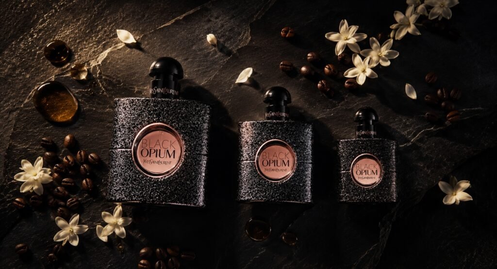 YSL Black Opium EDP size comparison 30ml 50ml 90ml dark luxury flat lay
